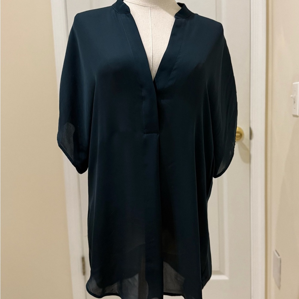 Women ,dark green shirt